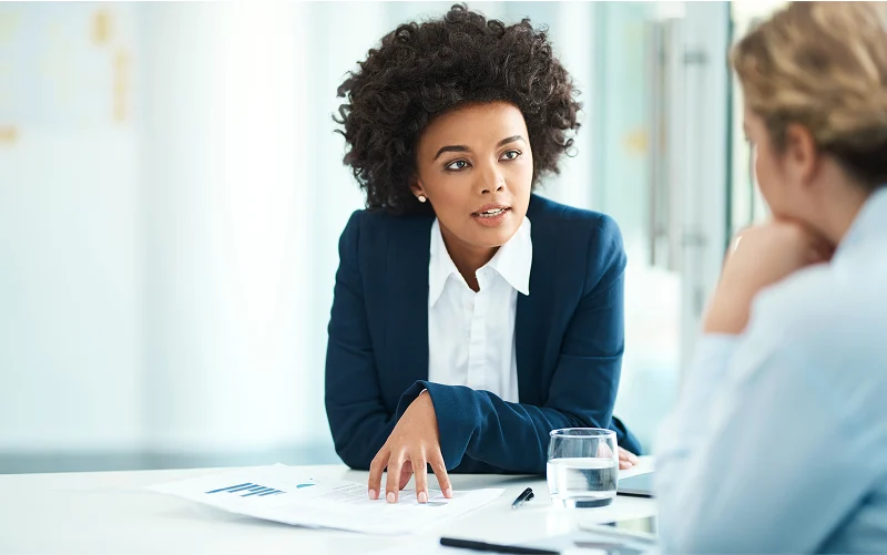 Woman speaking in meeting