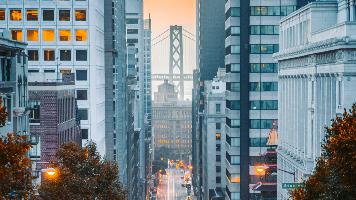 City street view with suspension bridge