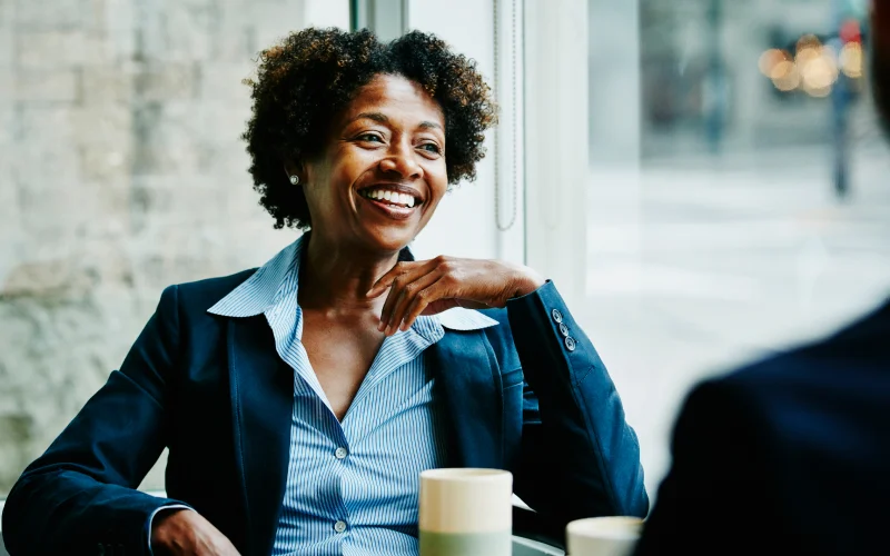 Woman smiling in meeting