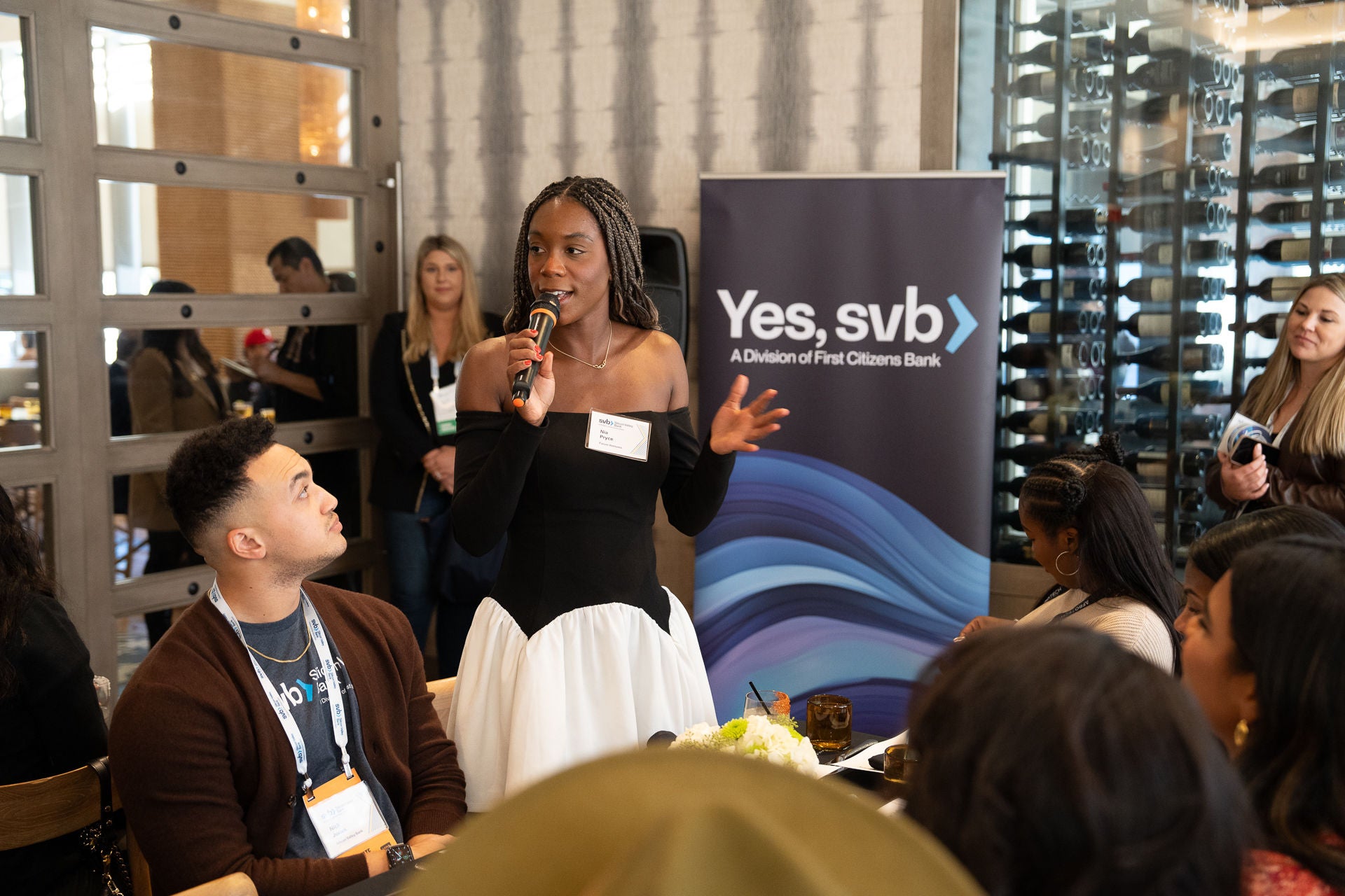 Woman speaking at event
